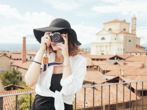 Woman taking photos in an exotic location